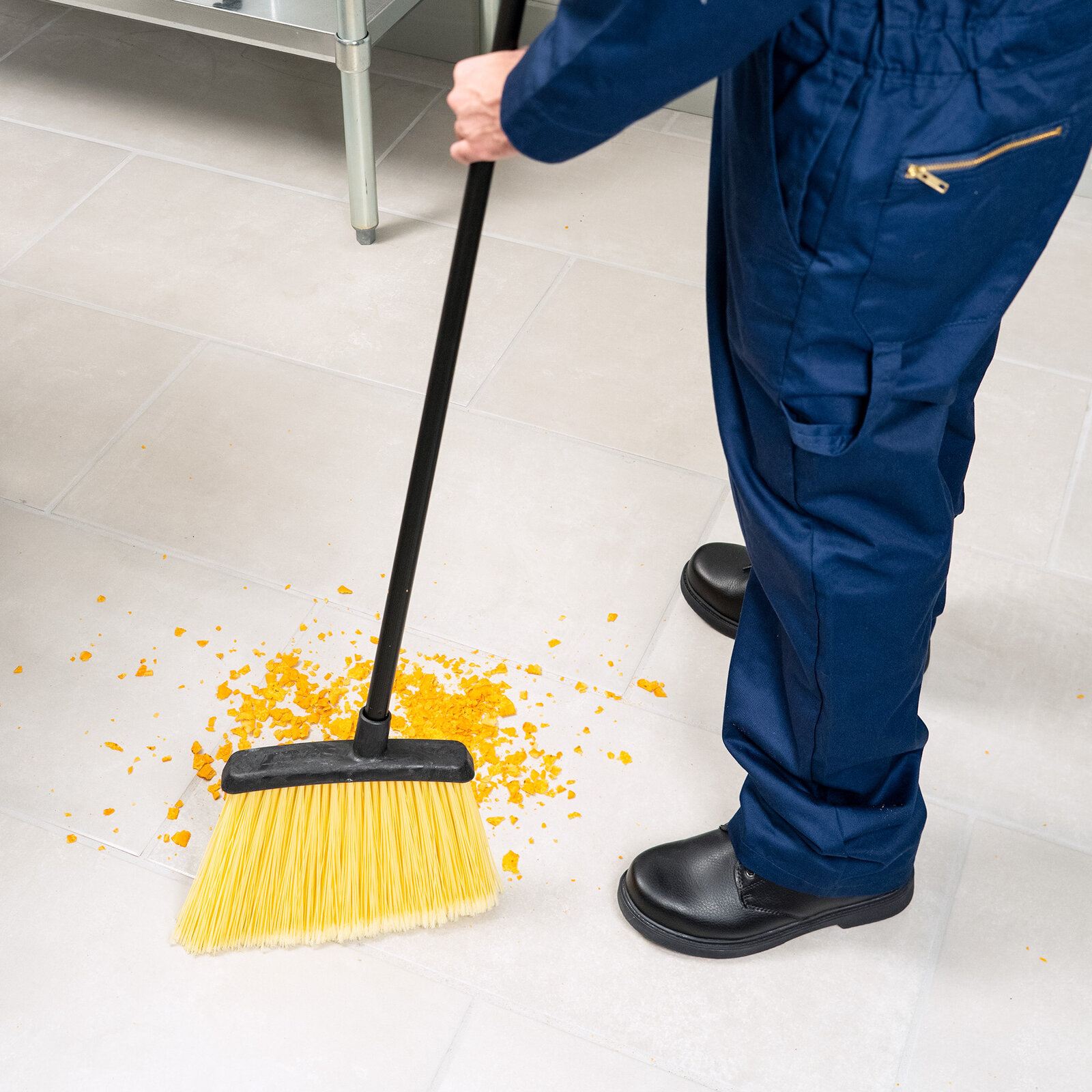 sweep the floor with a broom